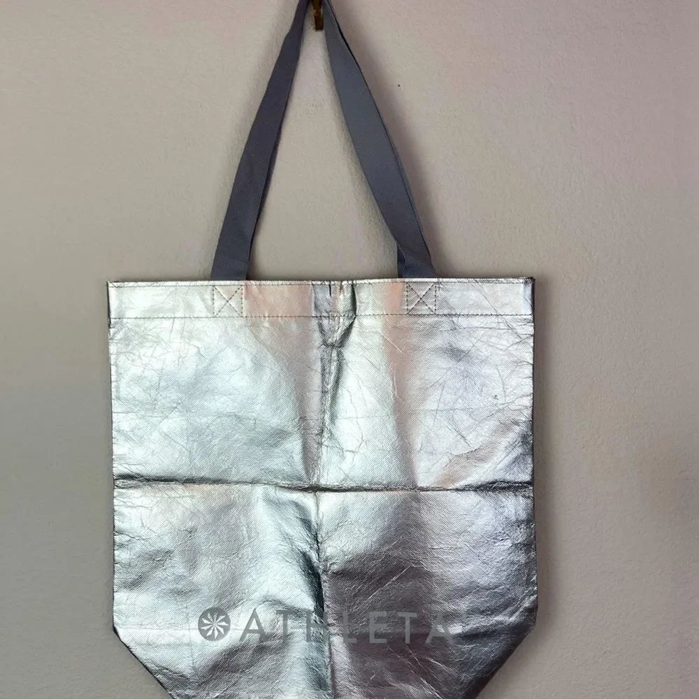 Free with Athleta purchase! silver tote w/ canvas handles